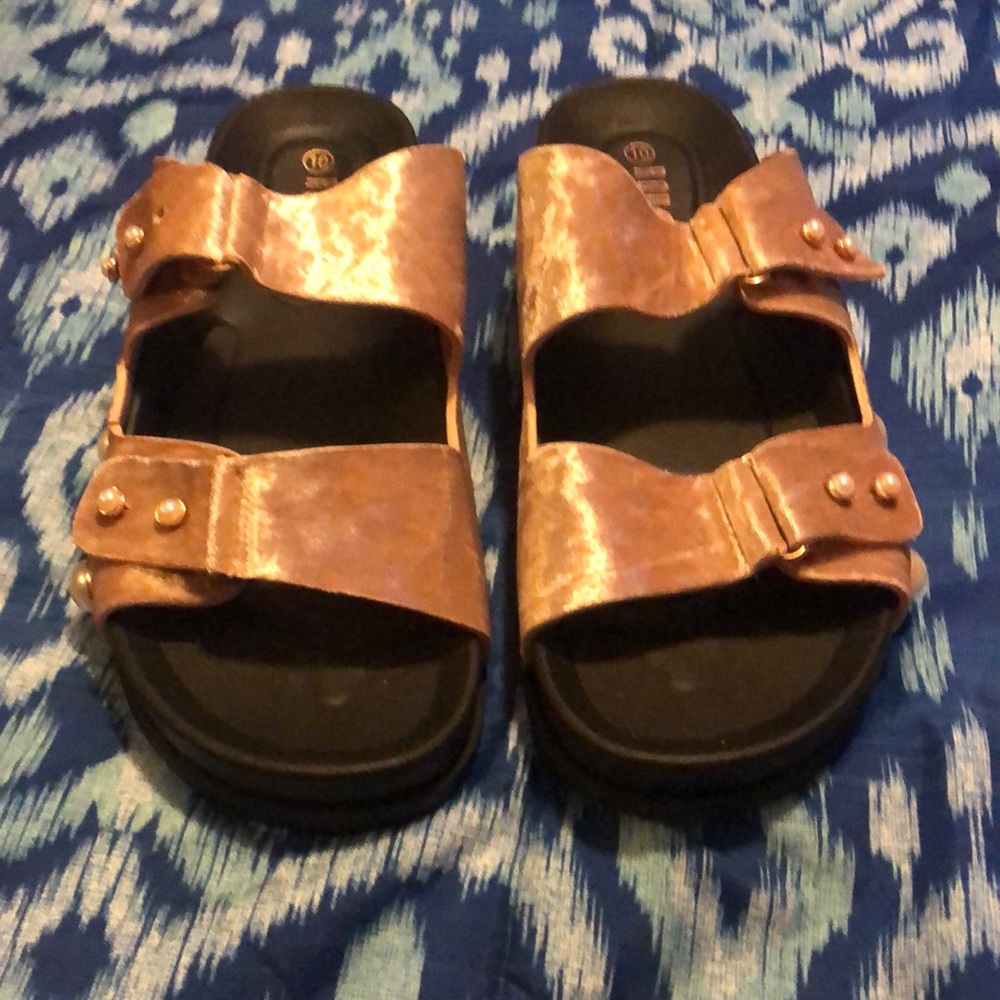 Rose gold rouge sandals.